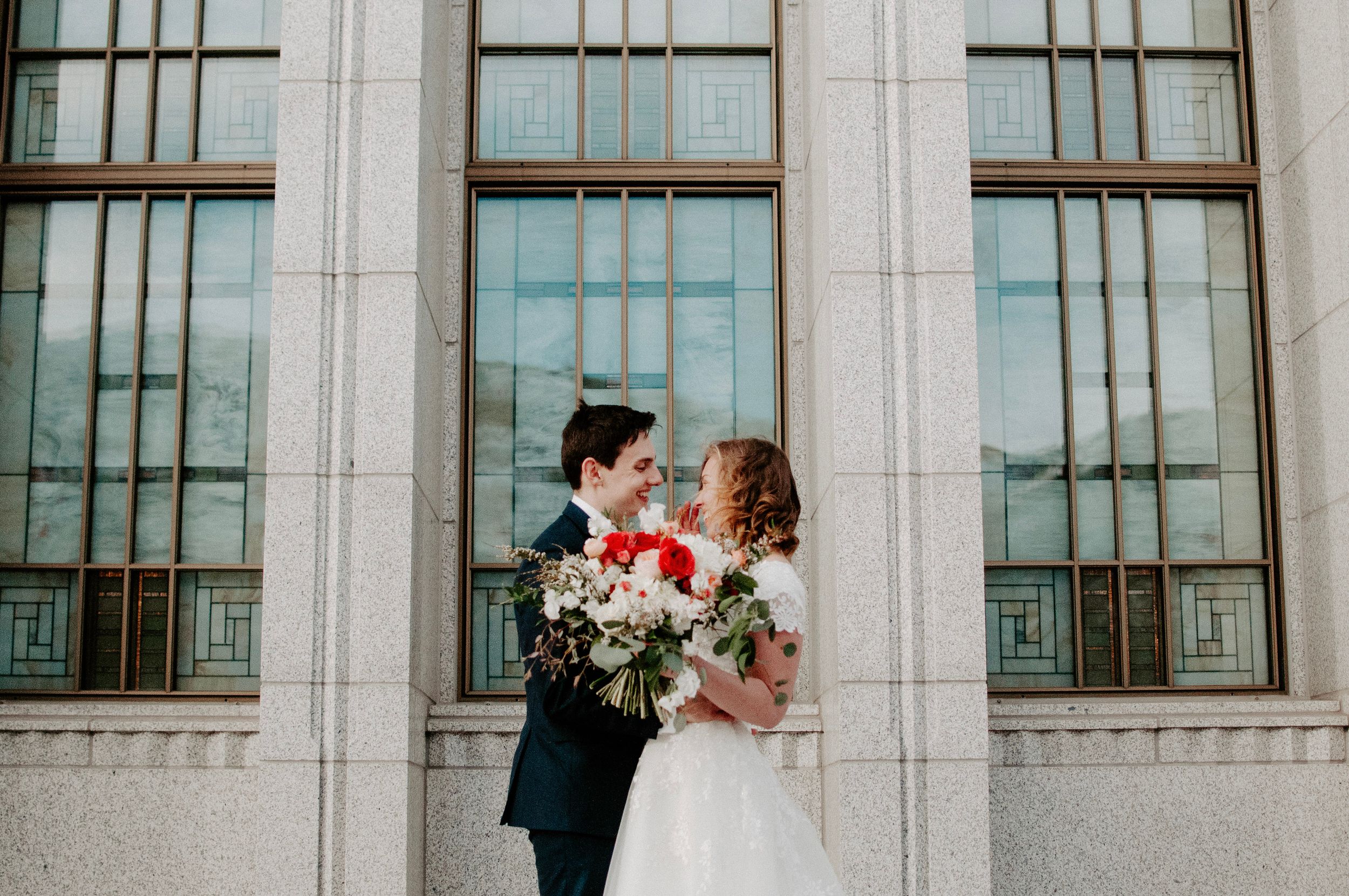 alabama and washington wedding photographer sarah mismash on her wedding day with her husband, neither wearing any makeup