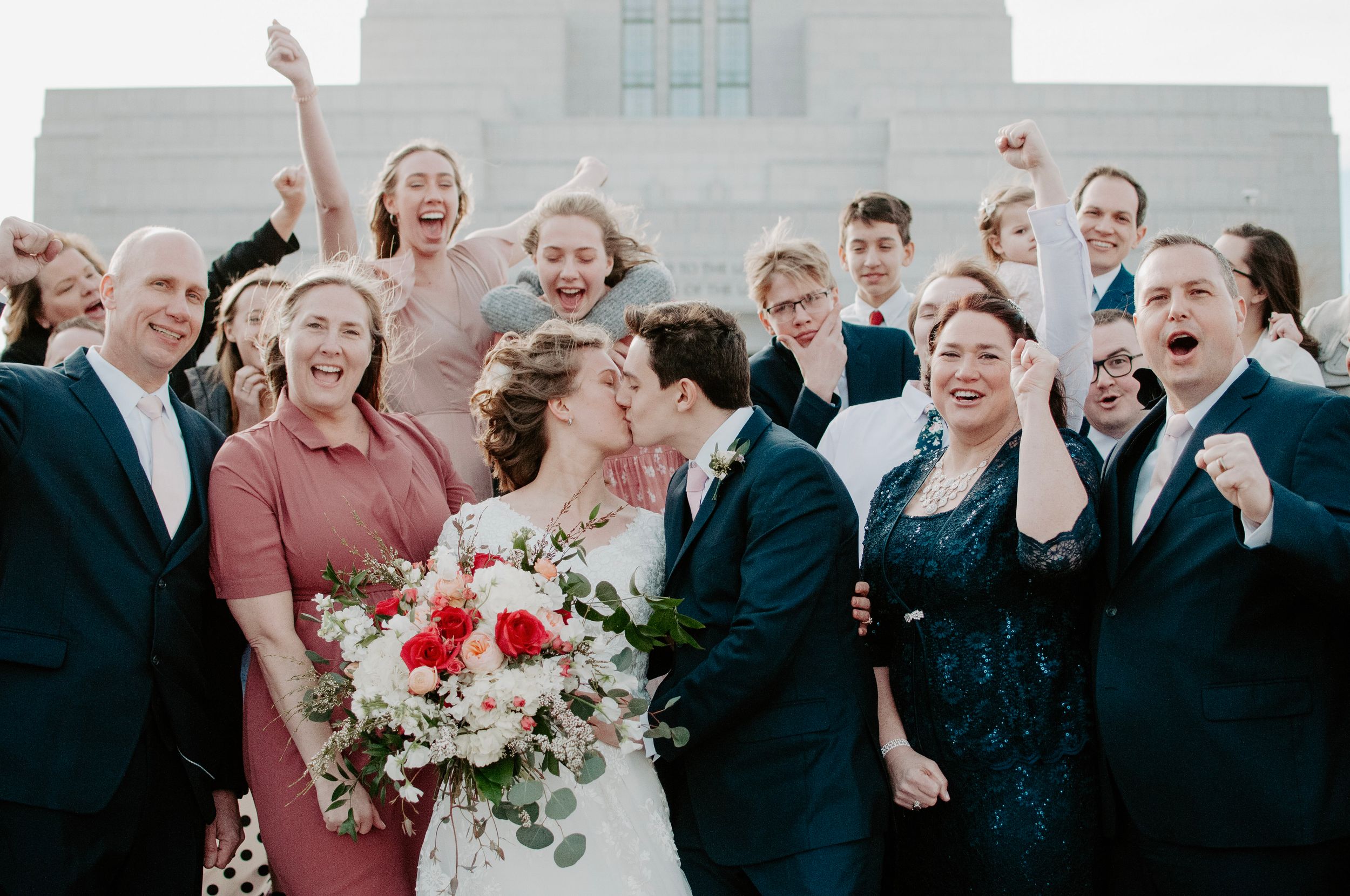 alabama and washington wedding photographer sarah mismash on her wedding day with her husband and guests, not wearing any makeup