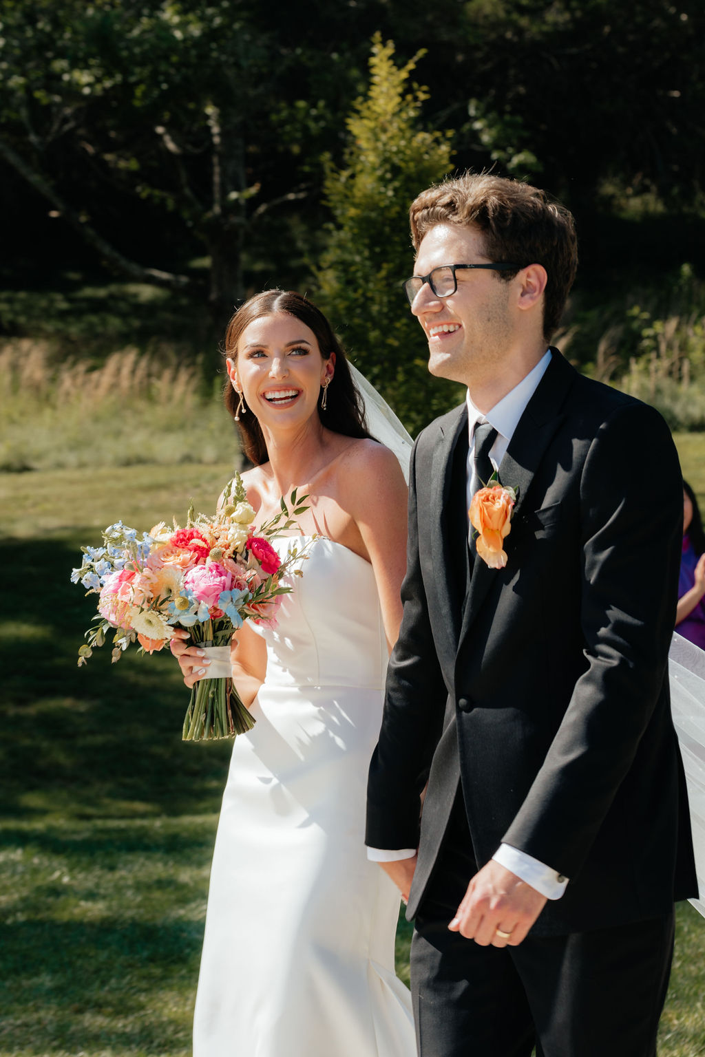 a bride and groom walk together during wedding ceremony at howe farms in chattanooga tennessee