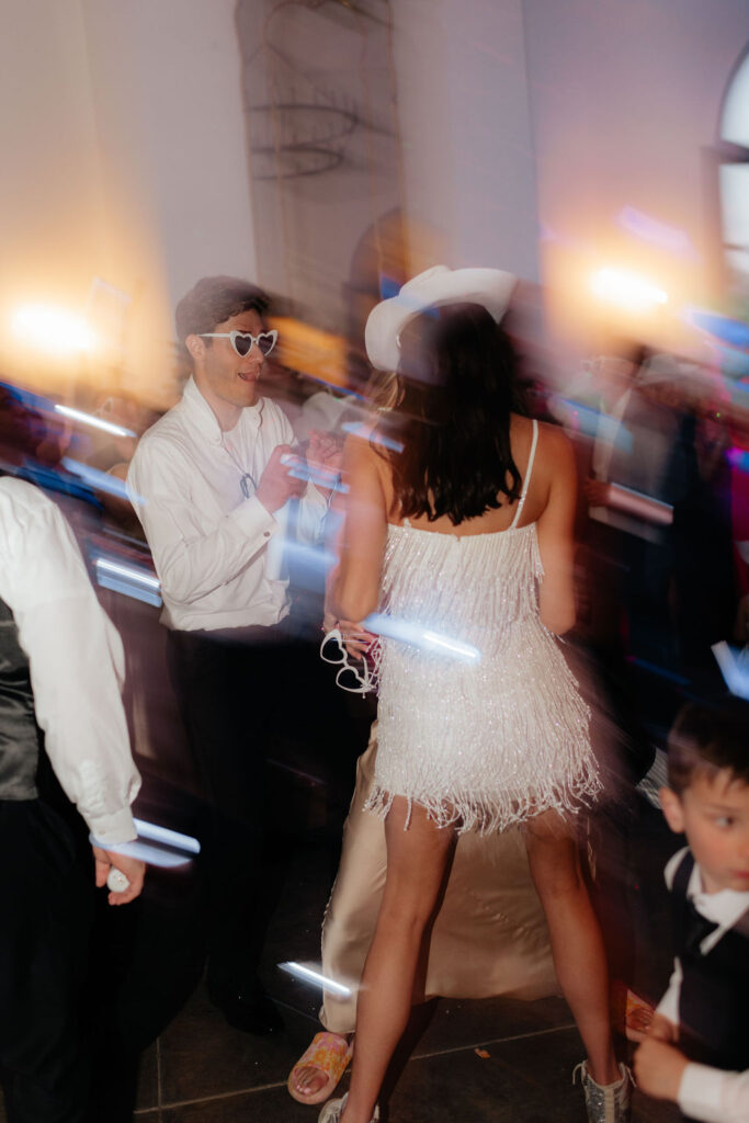 a bride and groom dance together during their wedding reception at howe farms, a chattanooga, tn a european inspired venue