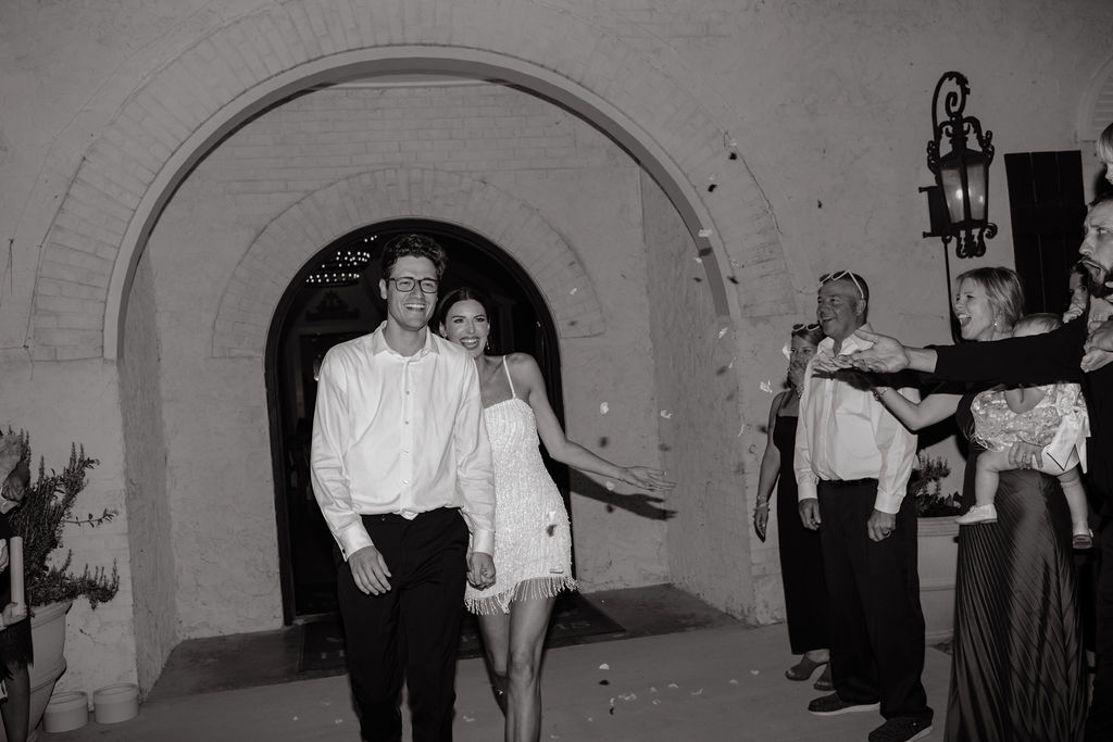 a couple exits their wedding reception at howe farms in chattanooga, tn