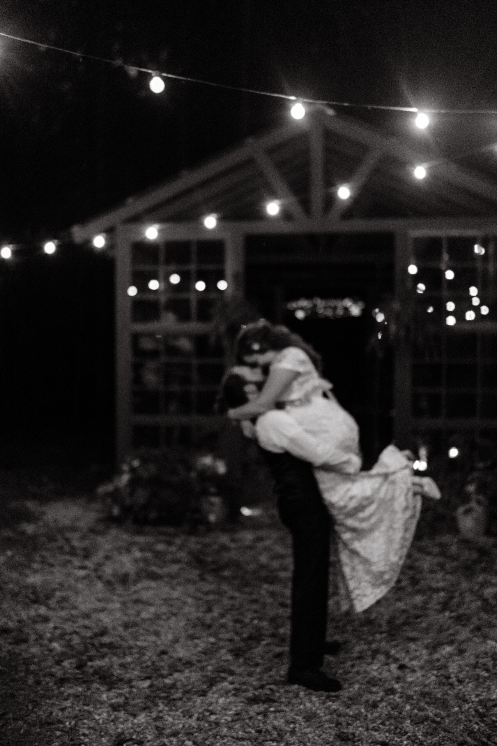 a couple celebrates together during their first look at the glasshouse alabama eden with alabama wedding photographer Sarah Mismash