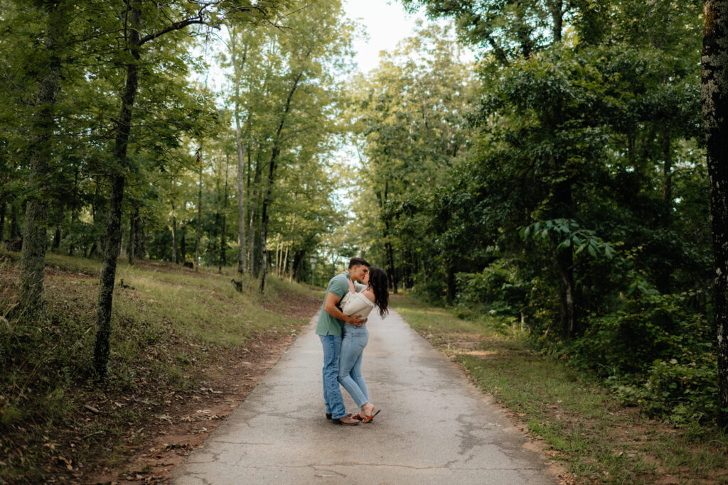 Couple holding each other at Pine Mountain, Georgia Engagement Photos by Alabama photographer Sarah Mismash