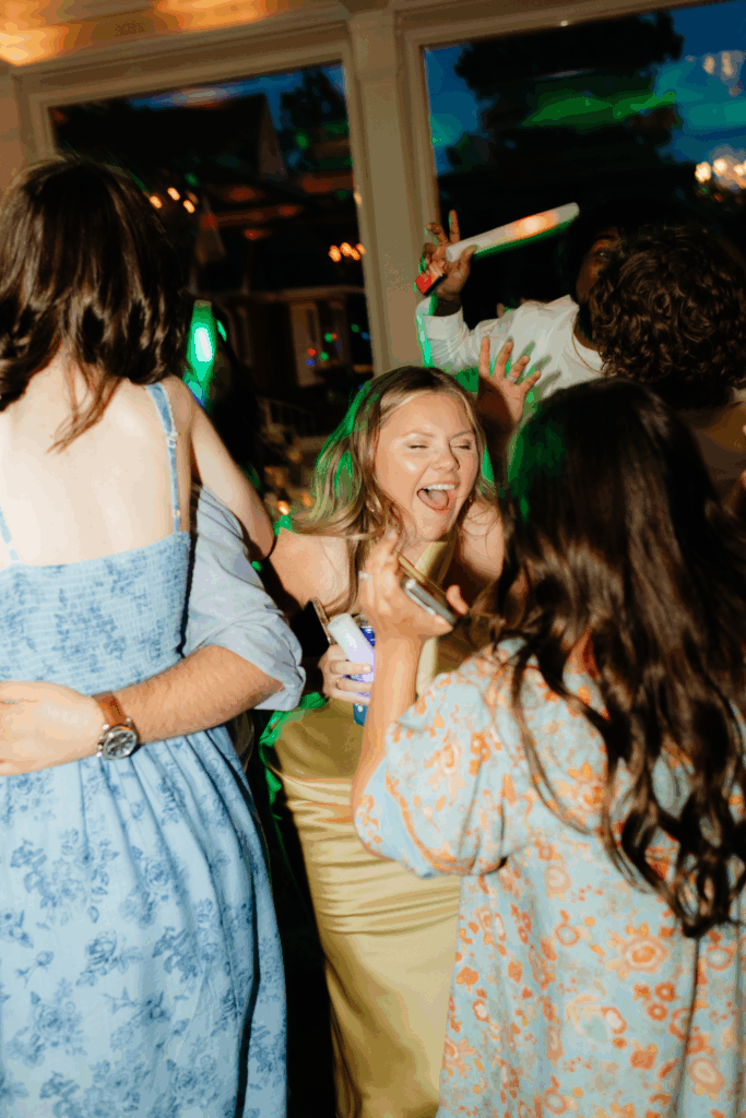 flash wedding dance floor photo of a wedding guest at a wedding reception in seattle, WA photographed by washington wedding photographer Sarah Mismash