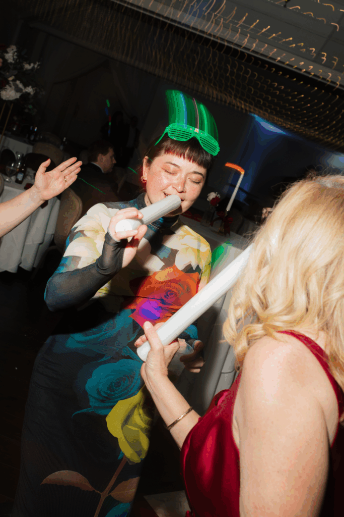 flash wedding dance floor photo of a bridesmaid at a wedding in seattle, WA photographed by washington wedding photographer Sarah Mismash