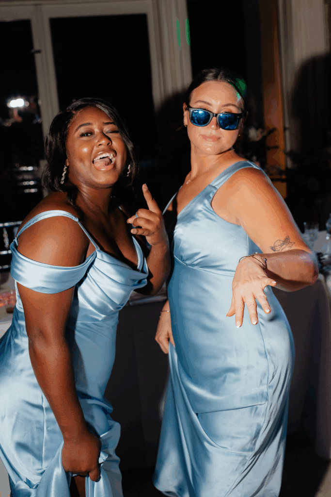 flash wedding dance floor photo of two bridesmaids at a wedding in seattle, WA photographed by washington wedding photographer Sarah Mismash
