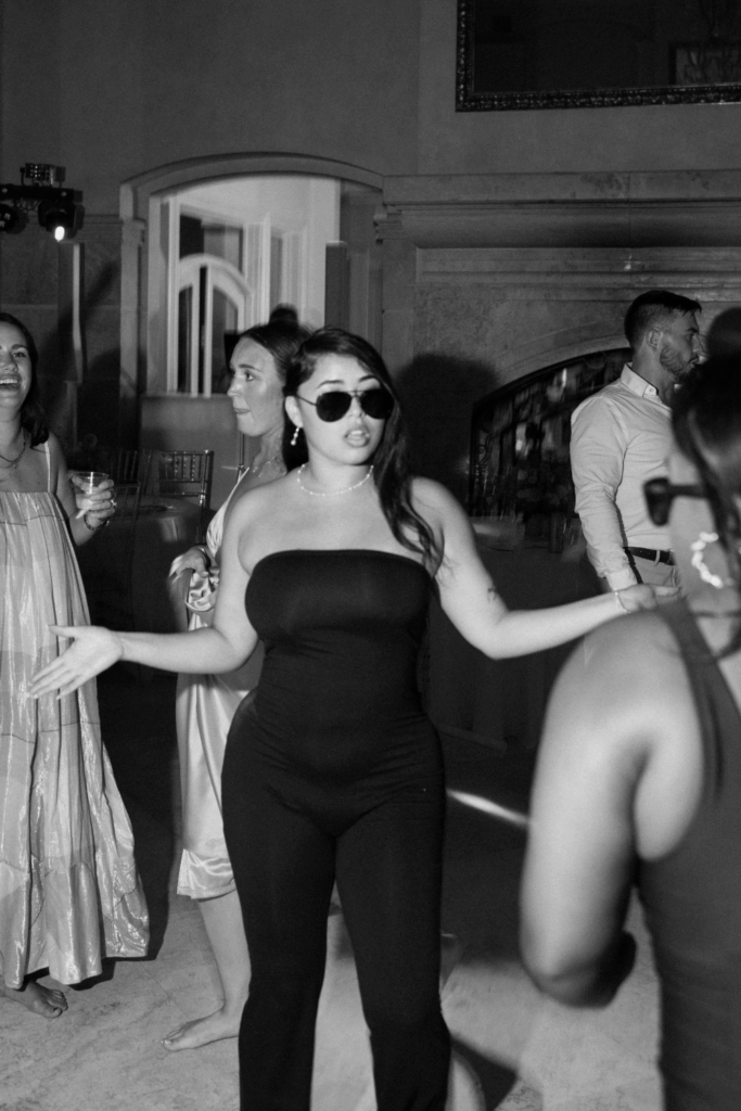 flash wedding dance floor photo of a bridesmaid at a wedding in seattle, WA photographed by washington wedding photographer Sarah Mismash