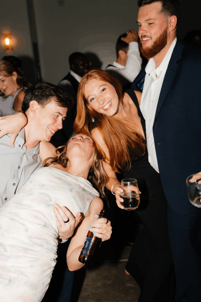flash wedding dance floor photo of wedding guests at a wedding in seattle, WA photographed by washington wedding photographer Sarah Mismash