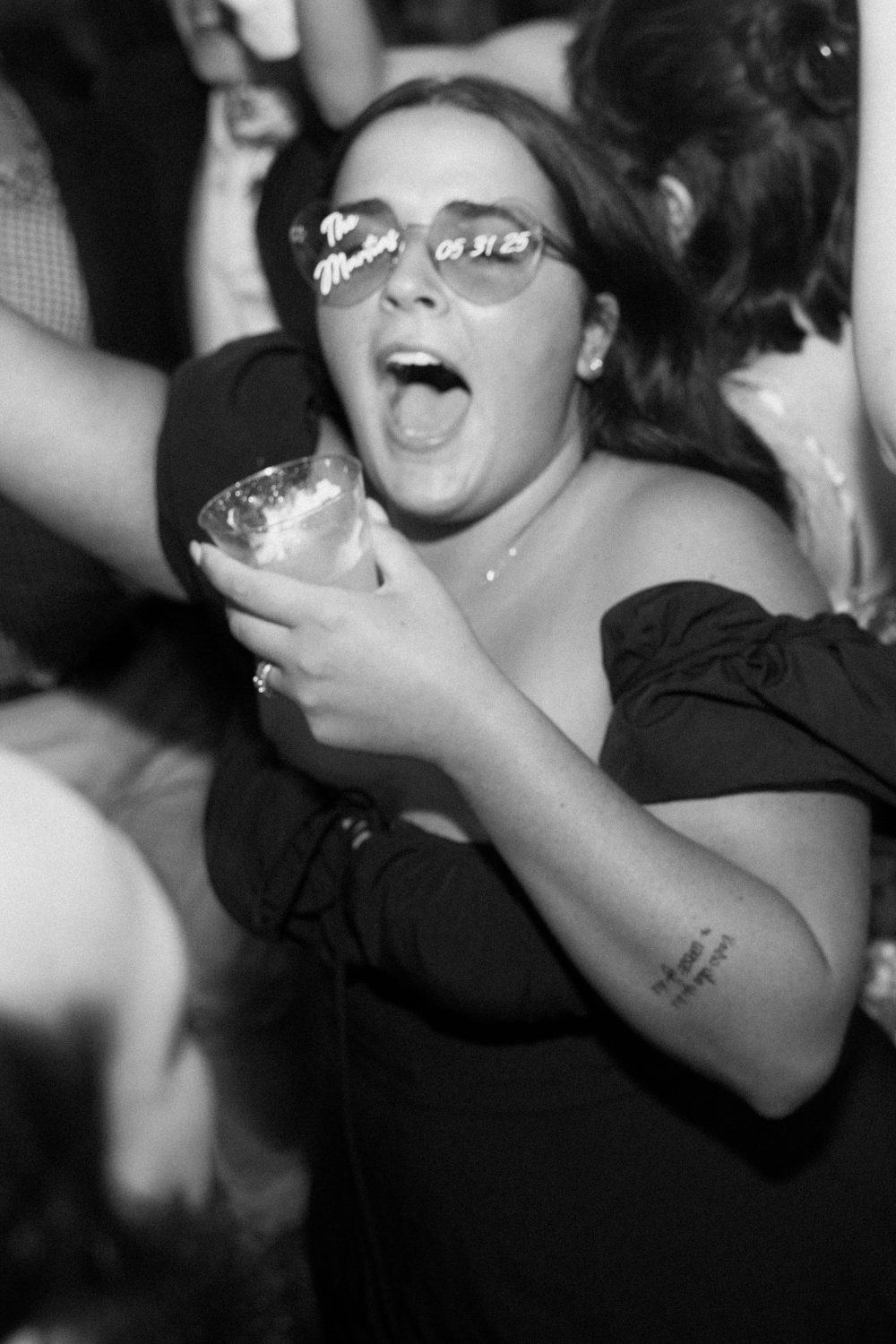 flash wedding dance floor photo of a bridesmaid at a wedding in seattle, WA photographed by washington wedding photographer Sarah Mismash