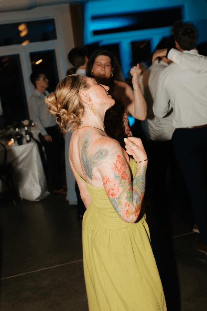 flash wedding dance floor photo of a wedding guest at a wedding in seattle, WA photographed by washington wedding photographer Sarah Mismash