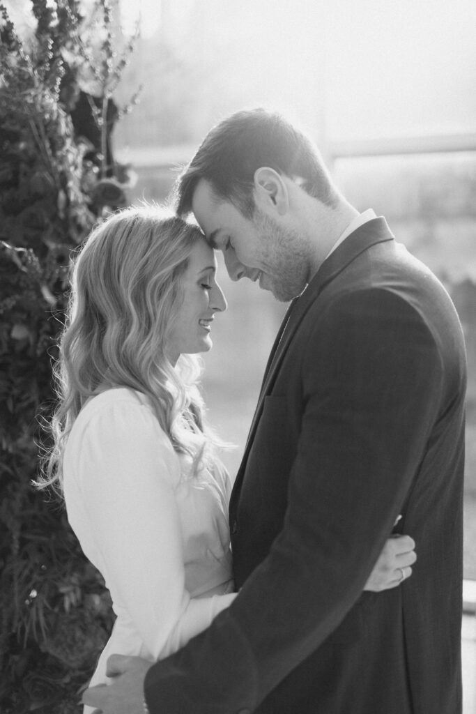 an engaged couple breaths together together during their engagement photos at the Seattle Art Museum with seattle engagement photographer Sarah Mismash