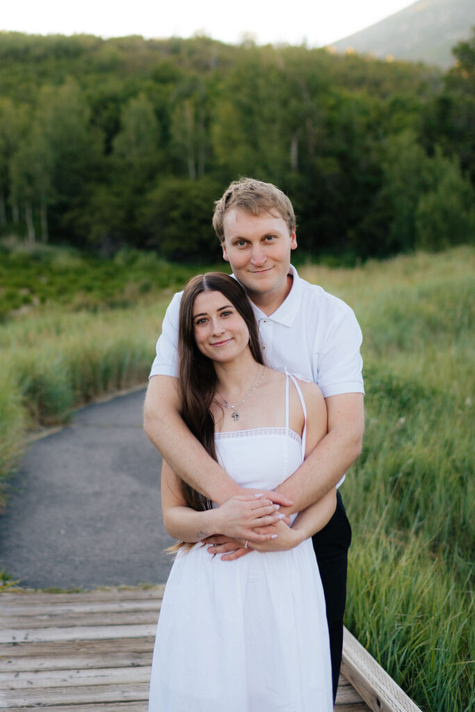 a couple during their summer engagment photos in the alpine loop at american fork canyon and provo canyon, photographed by utah county engagement photographer sarah mismash