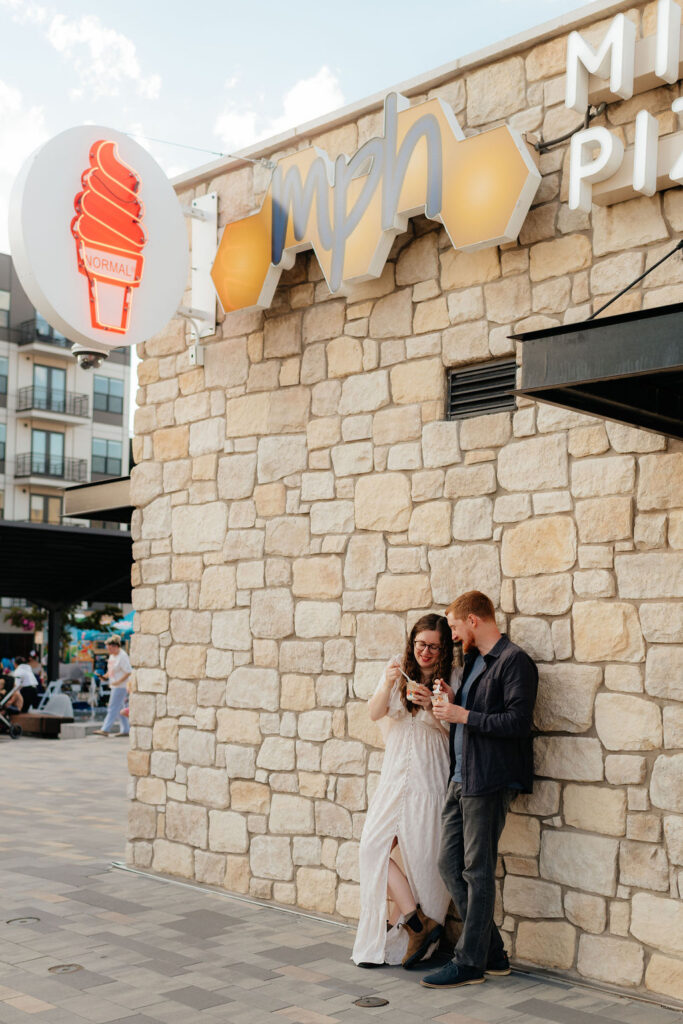 a couple stops for ice cream at the normal ice cream truck at millcreek commons during their september engagement photos in slc, utah